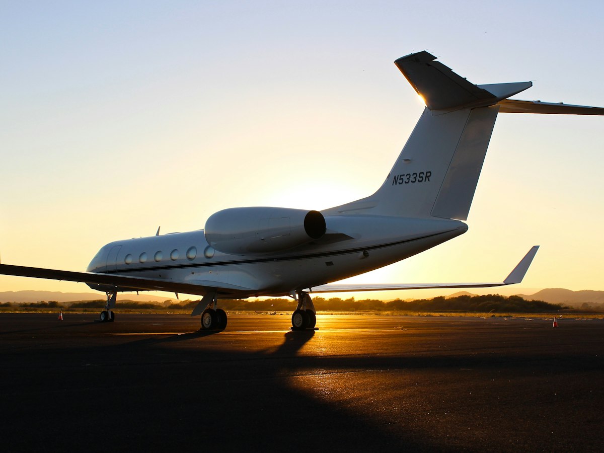 Private jet at sunset